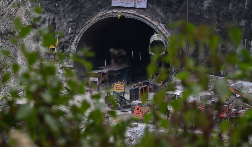 Rescue personnel work at the collapsed under construction Silkyara tunnel in the Uttarkashi district of India's Uttarakhand state, on November 27, 2023. Indian military engineers on November 27 were preparing to dig by hand to reach 41 workers trapped in a collapsed road tunnel for 15 days, a rescue operation hit by repeated setbacks. (Photo by Sajjad HUSSAIN / AFP) (Photo by SAJJAD HUSSAIN/AFP via Getty Images)