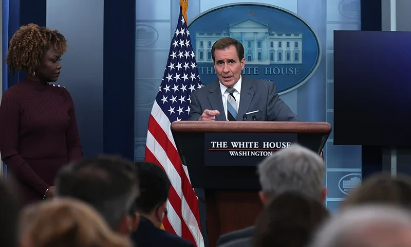 WASHINGTON, DC - NOVEMBER 27: National Security Council Coordinator for Strategic Communications John Kirby speaks as White House Press Secretary Karine Jean-Pierre listens during a daily news briefing at the James S. Brady Press Briefing Room of the White House on November 27, 2023 in Washington, DC. Press Secretary Jean-Pierre hosted a daily news briefing to answer questions from members of the press. (Photo by Alex Wong/Getty Images)