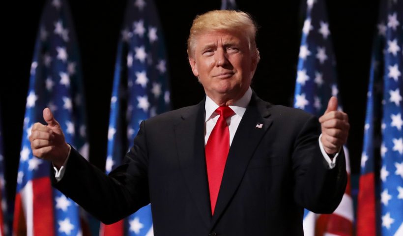 CLEVELAND, OH - JULY 21: Republican presidential candidate Donald Trump gives two thumbs up to the crowd during the evening session on the fourth day of the Republican National Convention on July 21, 2016 at the Quicken Loans Arena in Cleveland, Ohio. Republican presidential candidate Donald Trump received the number of votes needed to secure the party's nomination. An estimated 50,000 people are expected in Cleveland, including hundreds of protesters and members of the media. The four-day Republican National Convention kicked off on July 18. (Photo by Chip Somodevilla/Getty Images)