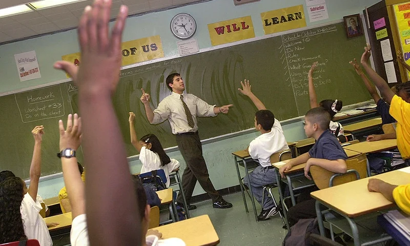 379693 07: Teacher David Nieder of "Knowledge is Power Program" (KIPP) Academy takes questions from his class October 4, 2000 in The Bronx, New York. The Knowledge Is Power Program educates 200 middle-school students, mostly poor black and Latino neighborhood children, housed in a hallway on the fourth floor of a regular Bronx public schooI. Because of strict discipline where each student gets two hours of homework a night and a regular school day runs nine-and-a-half-hours, including Saturdays and throughout the summer, test scores are the highest in the Bronx. Governor George Bush of Texas, where another KIPP school is run, singled out KIPP for praise during his presidential debate against Vice President Al Gore. (Photo by Chris Hondros/Newsmakers)
