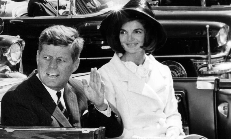The President and Mrs. Kennedy ride in a parade March 27, 1963 in Washington. (Photo by National Archive/Newsmakers)