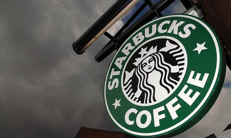 NORTHWICH, UNITED KINGDOM - JULY 03: The Starbucks logo hangs outside one of the company's cafes in Northwich on 3 July, 2008 in Northwich, England. (Photo by Christopher Furlong/Getty Images)