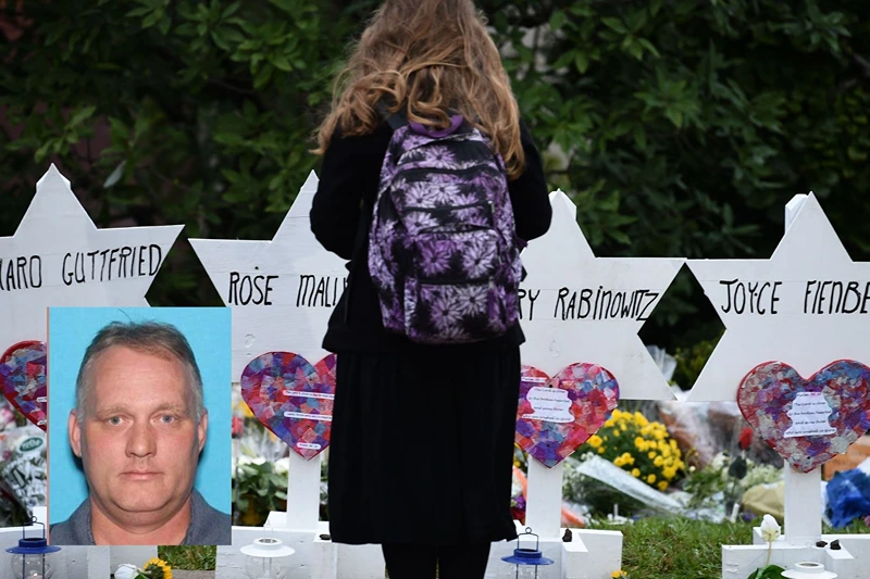 B| TOPSHOT - A woman stands at a memorial outside the Tree of Life synagogue after a shooting there left 11 people dead in the Squirrel Hill neighborhood of Pittsburgh on October 27. Mourners held an emotional vigil Sunday for victims of a fatal shooting at a Pittsburgh synagogue, an assault that saw a gunman who said he "wanted all Jews to die" open fire on a mostly elderly group. Americans had earlier learned the identities of the 11 people killed in the brutal assault at the Tree of Life synagogue, including 97-year-old Rose Mallinger and couple Sylvan and Bernice Simon, both in their 80s.Nine of the victims were 65 or older. (Photo by Brendan SMIALOWSKI / AFP) (Photo by BRENDAN SMIALOWSKI/AFP via Getty Images) F| Pittsburgh Police Department