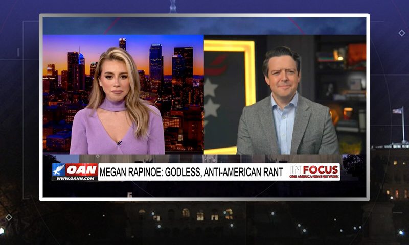Video still from In Focus on One America News Network showing a split screen of the host on the left side, and on the right side is the guest, Ryan Helfenbein.