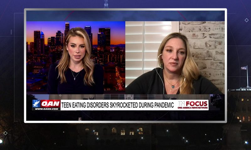 Video still from In Focus on One America News Network showing a split screen of the host on the left side, and on the right side is the guest, Dr. Shannon Kroner.