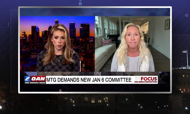 Video still from In Focus on One America News Network showing a split screen of the host on the left side, and on the right side is the guest, Rep. Marjorie Taylor Greene.