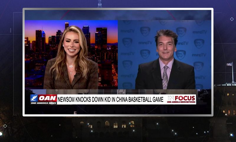 Video still from In Focus on One America News Network showing a split screen of the host on the left side, and on the right side is the guest, Eric Scheiner.