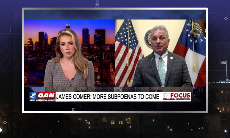 Video still from In Focus on One America News Network showing a split screen of the host on the left side, and on the right side is the guest, Rep. Buddy Carter.
