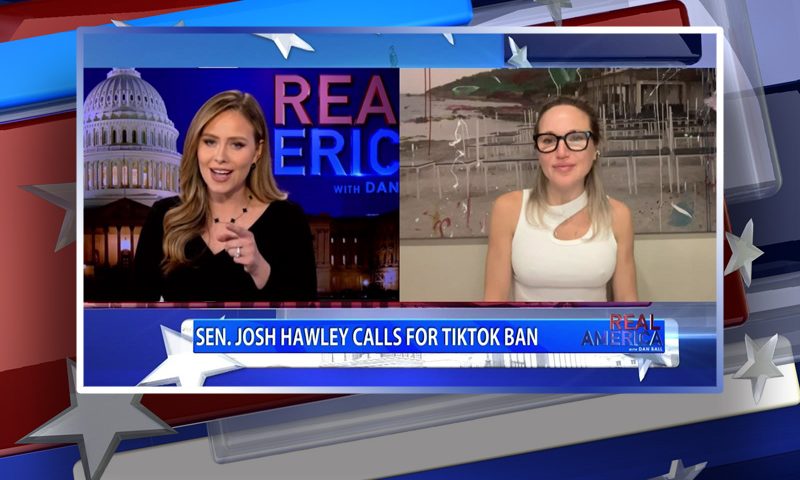 Video still from Real America on One America News Network showing a split screen of the host on the left side, and on the right side is the guest, Jacqueline Toboroff.