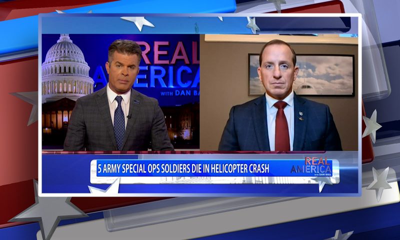 Video still from Real America on One America News Network showing a split screen of the host on the left side, and on the right side is the guest, Lt. Col. Darin Gaub.