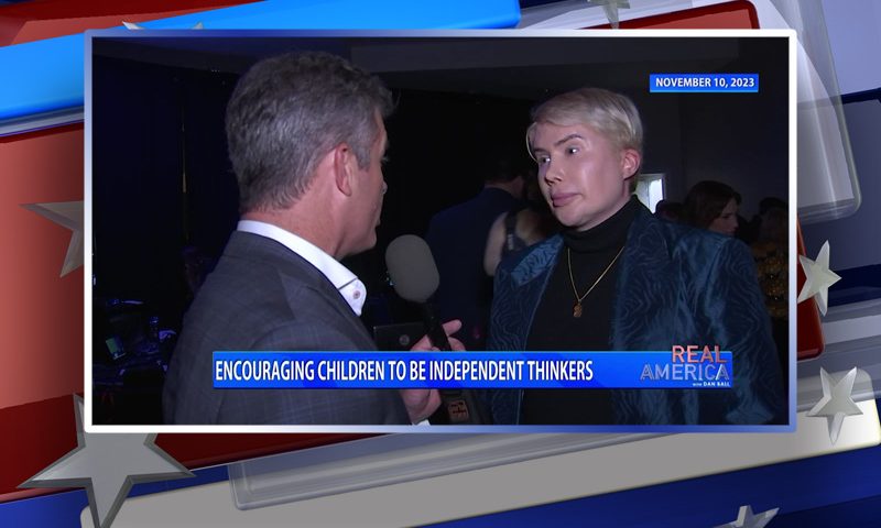 Video still from Real America on One America News Network during an interview with the guest, Oli London.