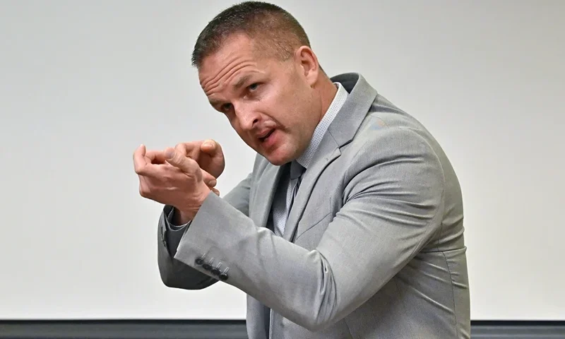 Former Louisville Police officer Brett Hankison describes what he saw in the apartment of Breonna Taylor during testimony, March 2, 2022, in Louisville, Ky. A federal judge on Thursday, Nov. 16, 2023 declared a mistrial in the trial of the former Louisville police officer who fired stray bullets in the deadly Breonna Taylor raid. Hankison was charged with using excessive force that violated the rights of Taylor, her boyfriend and her next-door neighbors. The 12-member jury struggled over several days to reach a verdict. (AP Photo/Timothy D. Easley, Pool)
