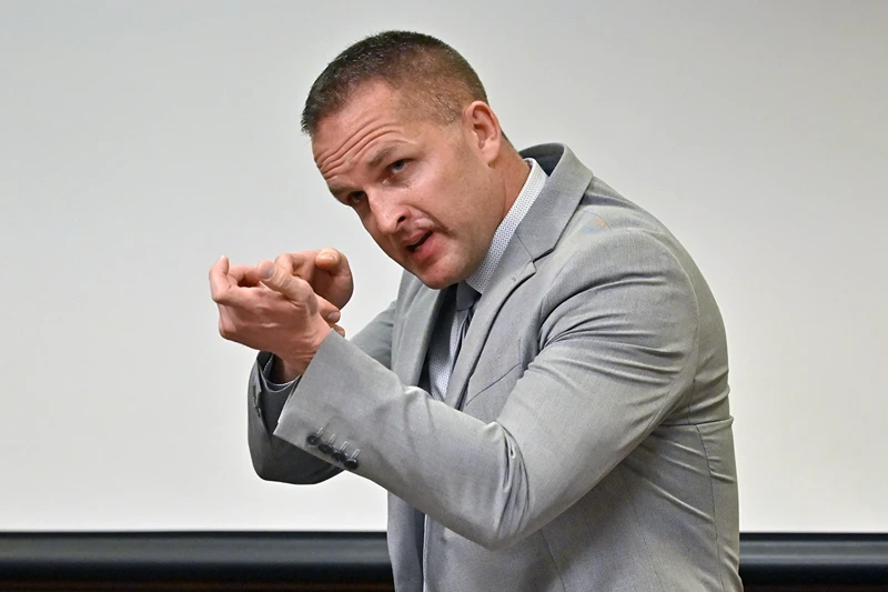 Former Louisville Police officer Brett Hankison describes what he saw in the apartment of Breonna Taylor during testimony, March 2, 2022, in Louisville, Ky. A federal judge on Thursday, Nov. 16, 2023 declared a mistrial in the trial of the former Louisville police officer who fired stray bullets in the deadly Breonna Taylor raid. Hankison was charged with using excessive force that violated the rights of Taylor, her boyfriend and her next-door neighbors. The 12-member jury struggled over several days to reach a verdict. (AP Photo/Timothy D. Easley, Pool)