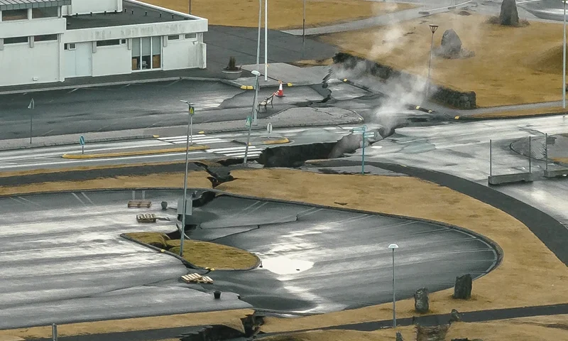 10 | This image taken with a drone shows cracks next to a children playground in the town of Grindavik, Iceland, Thursday, Nov. 16, 2023. Residents of fishing town in southwestern Iceland have left their homes after increasing concern about a potential volcanic eruption caused civil defense authorities to declare a state of emergency in the region. Iceland's Meteorological Office says police decided to evacuate Grindavik after recent seismic activity in the area moved south toward the town. (AP Photo/Bjorn Steinbekk)