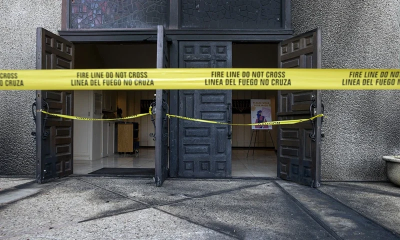 1 of 5 | Caution tape marks the front doors at Congregation Beth Israel on Nov. 1, 2021, after someone started a fire at the Central Austin synagogue in Austin, Texas, the previous day. Franklin Sechriest who set fire to the synagogue in an antisemitic attack two years ago was sentenced on Wednesday, Nov. 29, 2023, to 10 years in prison. (Jay Janner/Austin American-Statesman via AP)