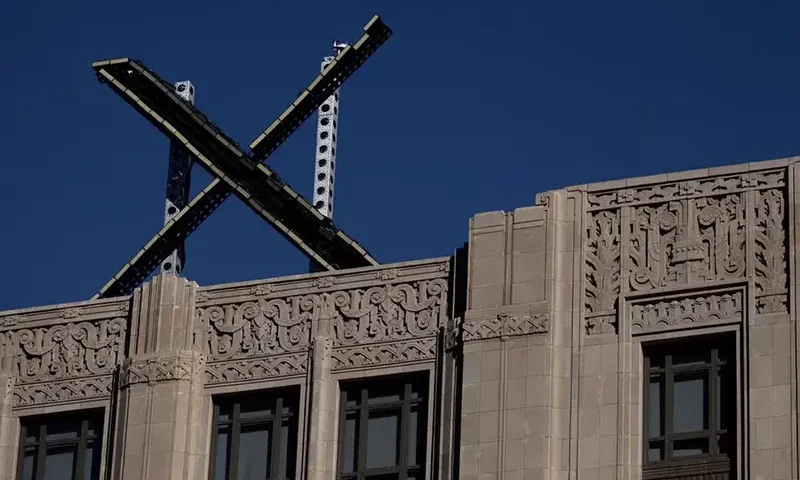 'X' logo is seen on the top of the headquarters of the messaging platform X, formerly known as Twitter, in downtown San Francisco, California, U.S., July 30, 2023. REUTERS/Carlos Barria/File Photo