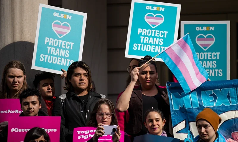 Rally Held In Support Of Transgender Community NEW YORK, NY - OCTOBER 24: L.G.B.T. activists and their supporters rally in support of transgender people on the steps of New York City Hall, October 24, 2018 in New York City. The group gathered to speak out against the Trump administration's stance toward transgender people. Last week, The New York Times reported on an unreleased administration memo that proposes a strict biological definition of gender based on a person's genitalia at birth. (Photo by Drew Angerer/Getty Images)