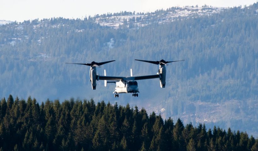 TOPSHOT - The United States' V-22 Osprey, a multi-mission, tiltrotor military aircraft with both vertical takeoff and landing, flies during a joint demonstration as part of the NATO Trident Juncture 2018 exercise in Byneset near Trondheim, Norway, October 30, 2018. Trident Juncture 2018, is a NATO-led military exercise held in Norway from 25 October to 7 November 2018. The exercise is the largest of its kind in Norway since the 1980s. Around 50,000 participants from NATO and partner countries, some 250 aircraft, 65 ships and up to 10,000 vehicles take part in the exercise. The main goal of Trident Juncture is allegedly to train the NATO Response Force and to test the alliance's defence capability. (Photo by Jonathan NACKSTRAND / AFP) (Photo by JONATHAN NACKSTRAND/AFP via Getty Images)