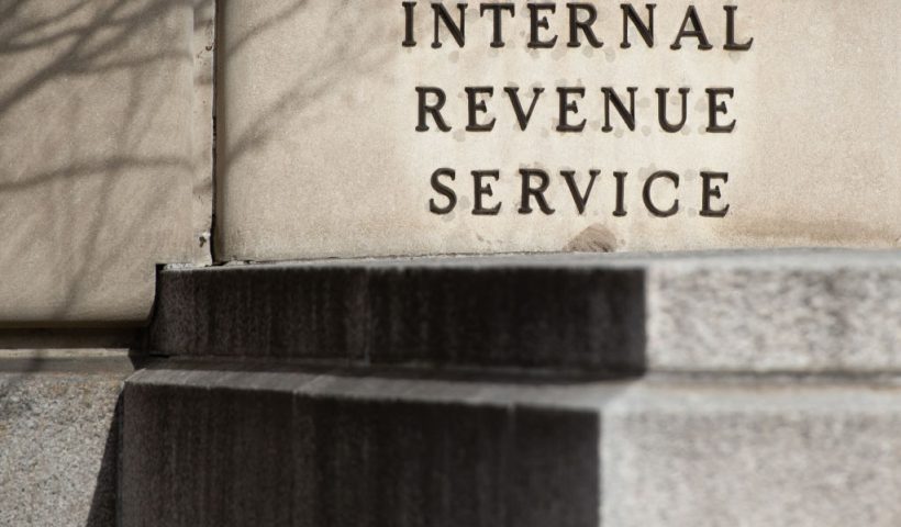 The US Internal Revenue Service (IRS) building is seen on the first work day for furloughed federal workers following a 35-day partial government shutdown in Washington, DC, January 28, 2019. - The five-week government shutdown subtracted $11 billion from the US economy, about twice the amount President Donald Trump sought to fund a border wall, an independent congressional body said Monday. (Photo by SAUL LOEB / AFP) (Photo credit should read SAUL LOEB/AFP via Getty Images)