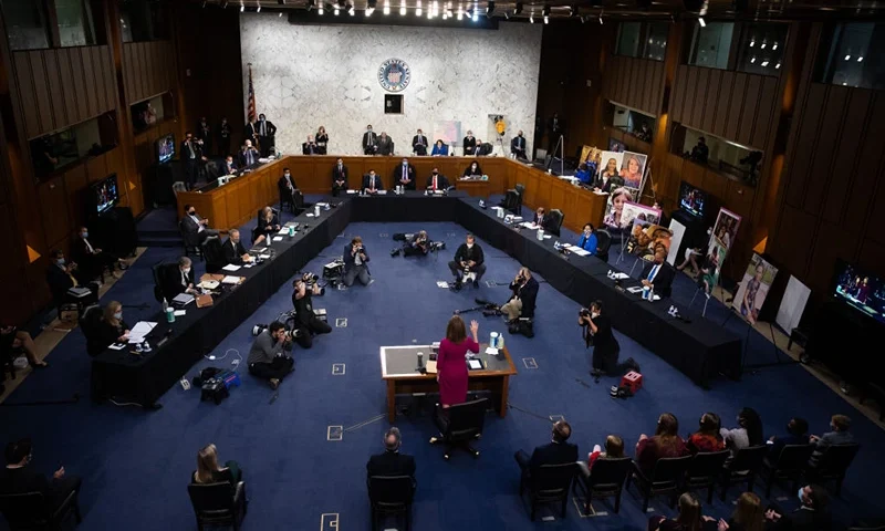TOPSHOT - Supreme Court nominee Judge Amy Coney Barrett is sworn into her Senate Judiciary Committee confirmation hearing on Capitol Hill on October 12, 2020 in Washington, DC. (Photo by Graeme JENNINGS / POOL / AFP) (Photo by GRAEME JENNINGS/POOL/AFP via Getty Images)