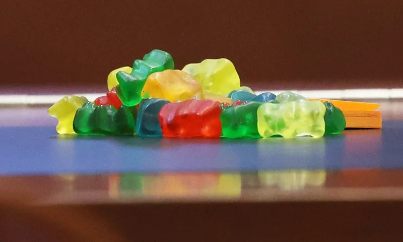 US-COURT-DEPP-HEARD A pile of Gummy Bears in front of US actor Johnny Depp's seat during the 50 million US dollar Depp vs Heard defamation trial at the Fairfax County Circuit Court in Fairfax, Virginia, on April 28, 2022. - US actor Johnny Depp sued his ex-wife Amber Heard for libel in Fairfax County Circuit Court after she wrote an op-ed piece in The Washington Post in 2018 referring to herself as a "public figure representing domestic abuse." (Photo by Michael REYNOLDS / POOL / AFP) (Photo by MICHAEL REYNOLDS/POOL/AFP via Getty Images)