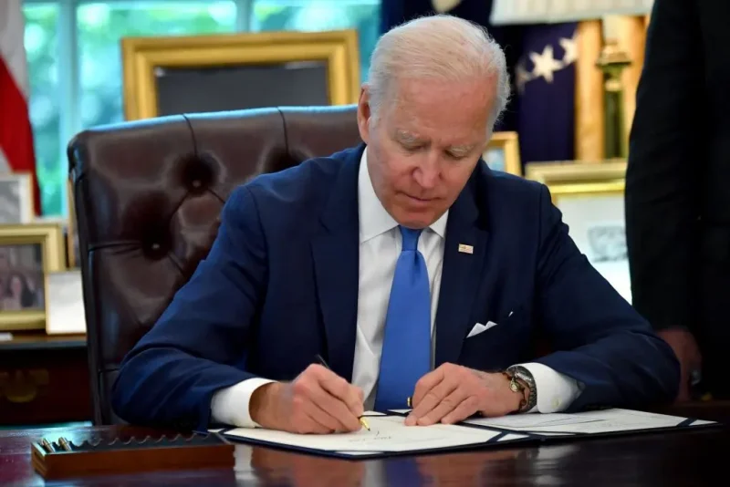 US President Joe Biden signs into law the Ukraine Democracy Defense Lend-Lease Act of 2022, in the Oval Office of the White House in Washington, DC, on May 9, 2022. - President Joe Biden on Monday eased the acceleration of US weapons shipments to Ukraine through a law based on a World War II measure helping US allies to defeat Nazi Germany. (Photo by Nicholas Kamm / AFP) (Photo by NICHOLAS KAMM/AFP via Getty Images)