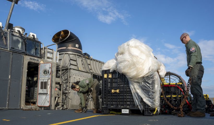 VIRGINIA BEACH, VA - FEBRUARY 10: In this U.S. Navy handout, Sailors assigned to Assault Craft Unit 4 prepare material recovered in the Atlantic Ocean from a high-altitude balloon for transport to federal agents at Joint Expeditionary Base Little Creek Feb. 10, 2023. At the direction of the President of the United States and with the full support of the Government of Canada, U.S. fighter aircraft under U.S. Northern Command authority engaged and brought down a high-altitude balloon within sovereign U.S. airspace and over U.S. territorial waters, Feb.4, 2023. Active duty, reserve, National Guard, and civilian personnel planned and executed the operation, and partners from the U.S. Coast Guard, Federal Aviation Administration, Federal Bureau of Investigation, and Naval Criminal Investigative Service (NCIS) ensured public safety throughout the operation and recovery efforts. (Photo by Ryan Seelbach/U.S. Navy via Getty Images)