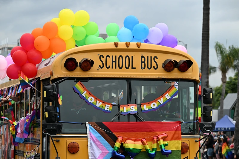 US-LGBTQ-PRIDE-PARADE
A school bus adorned with rainbow colors is the YMCA entry to the 2023 LA Pride Parade on June 11, 2023 in Hollywood, California. The LA Pride Parade marks the last day of the three-day Los Angeles celebration of lesbian, gay, bisexual, transgender, and queer (LGBTQ) social and self-acceptance, achievements, legal rights, and pride. (Photo by Robyn Beck / AFP) (Photo by ROBYN BECK/AFP via Getty Images)