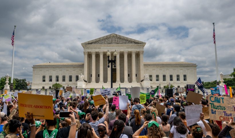 WASHINGTON, DC - JUNE 24: People protest in response to the Dobbs v Jackson Women's Health Organization ruling in front of the U.S. Supreme Court on June 24, 2022 in Washington, DC. The Court's decision in Dobbs v Jackson Women's Health overturns the landmark 50-year-old Roe v Wade case and erases a federal right to an abortion. (Photo by Brandon Bell/Getty Images)