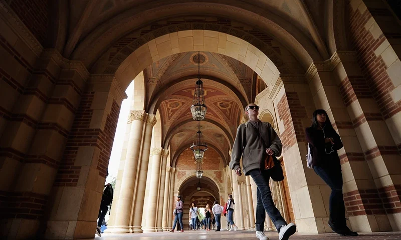 New Report: Half Of Recent College Graduates Under- Or Unemployed LOS ANGELES, CA - APRIL 23: Students walk near Royce Hall on the campus of UCLA on April 23, 2012 in Los Angeles, California. According to reports, half of recent college graduates with bachelor's degrees are finding themselves underemployed or jobless. (Photo by Kevork Djansezian/Getty Images)