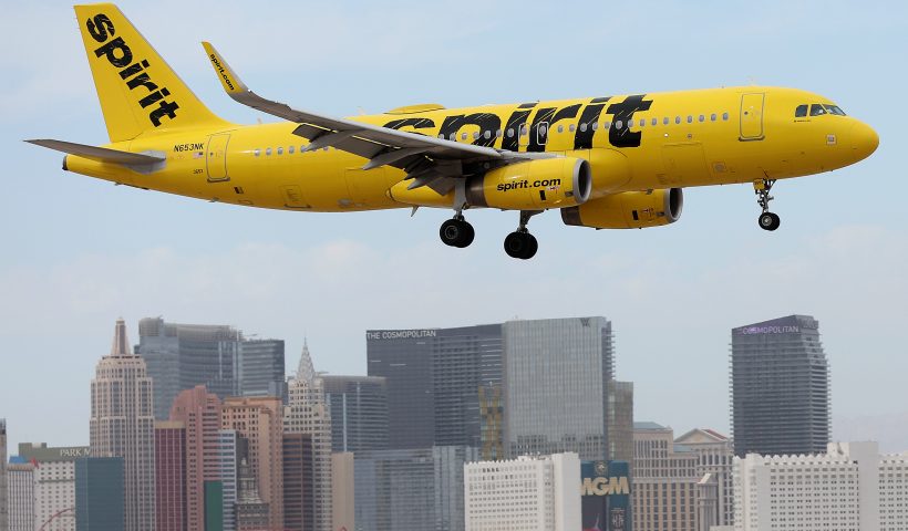 LAS VEGAS, NEVADA - OCTOBER 15: A Spirit Airlines plane lands at Harry Reid International Airport on October 15, 2022 in Las Vegas, Nevada. Holiday airfare prices are expected to be the most expensive in the last 5 years with Thanksgiving ticket prices up 25 percent from last year with the average round trip ticket price of $281. Christmas travel costs are up 55 percent from last year with round trip ticket prices averaging $435. (Photo by Justin Sullivan/Getty Images)