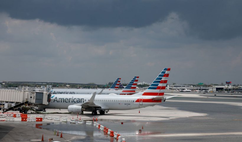 FORT LAUDERDALE, FLORIDA - APRIL 13: Planes sit at their gates after the Fort Lauderdale-Hollywood International Airport was closed due to the runways being flooded on April 13, 2023 in Fort Lauderdale, Florida. The heavy rain yesterday caused flooding as the region recorded rainfall totals of more than a foot. (Photo by Joe Raedle/Getty Images)