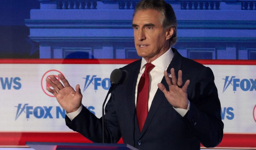 MILWAUKEE, WISCONSIN - AUGUST 23: Republican presidential candidate, North Dakota governor Doug Burgum participates in the first debate of the GOP primary season hosted by FOX News at the Fiserv Forum on August 23, 2023 in Milwaukee, Wisconsin. Eight presidential hopefuls squared off in the first Republican debate as former U.S. President Donald Trump, currently facing indictments in four locations, declined to participate in the event. (Photo by Win McNamee/Getty Images)