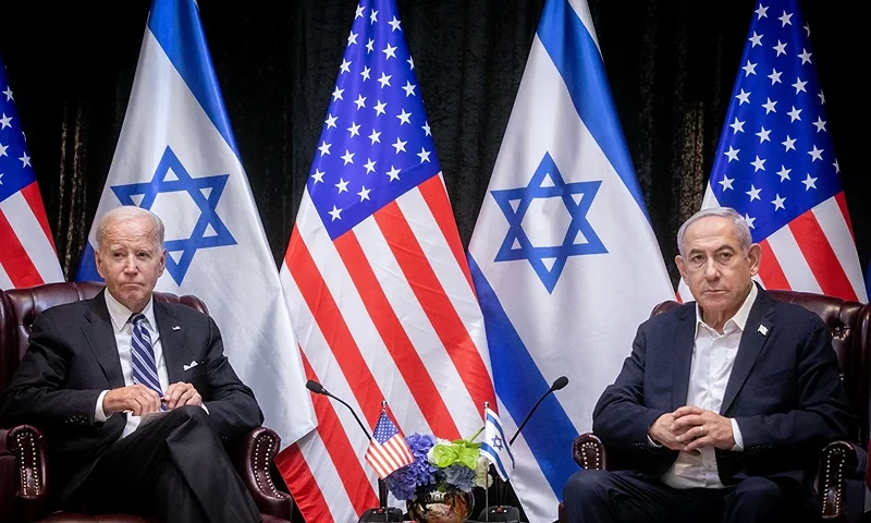US President Joe Biden (L), sits with Israeli Prime Minister Benjamin Netanyahu, at the start of the Israeli war cabinet meeting, in Tel Aviv on October 18, 2023, amid the ongoing battles between Israel and the Palestinian group Hamas. US President Joe Biden landed in Tel Aviv on October 18, 2023 as Middle East anger flared after hundreds were killed when a rocket struck a hospital in war-torn Gaza, with Israel and the Palestinians quick to trade blame. (Photo by Miriam Alster / POOL / AFP) (Photo by MIRIAM ALSTER/POOL/AFP via Getty Images)