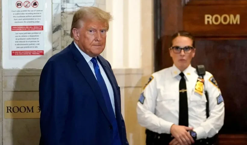 TOPSHOT - Former US President Donald Trump gestures during a break at court as he testifies during a fraud trial in New York City on October 25, 2023. The judge presiding over Donald Trump's civil fraud trial in New York fined the former US president $10,000 on October 25, 2023 for violating an order not to criticize court staff. (Photo by TIMOTHY A. CLARY / AFP) (Photo by TIMOTHY A. CLARY/AFP via Getty Images)