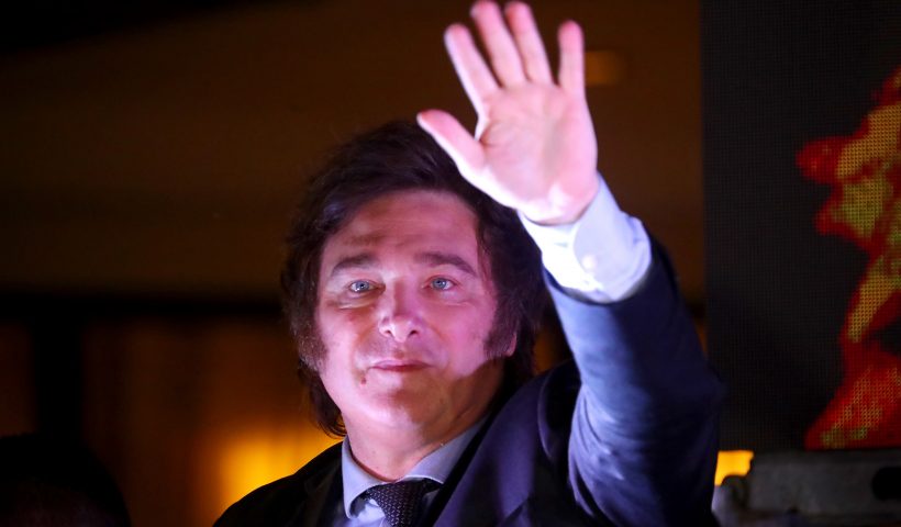Argentinians Head To Polls For Presidential Runoff Amid Economic Crisis BUENOS AIRES, ARGENTINA - NOVEMBER 19: Newly elected President of Argentina Javier Milei of La Libertad Avanza greets supporters after the polls closed in the presidential runoff on November 19, 2023 in Buenos Aires, Argentina. According to official results, Javier Milei of La Libertad Avanza reached 55,69% of the votes and Sergio Massa of Union Por La Patria 44,30%, with 99,25 of the votes counted. The presidential election runoff to succeed Alberto Fernandez comes as Argentinians have been hard hit by an annual 142,7% inflation. (Photo by Marcos Brindicci/Getty Images)