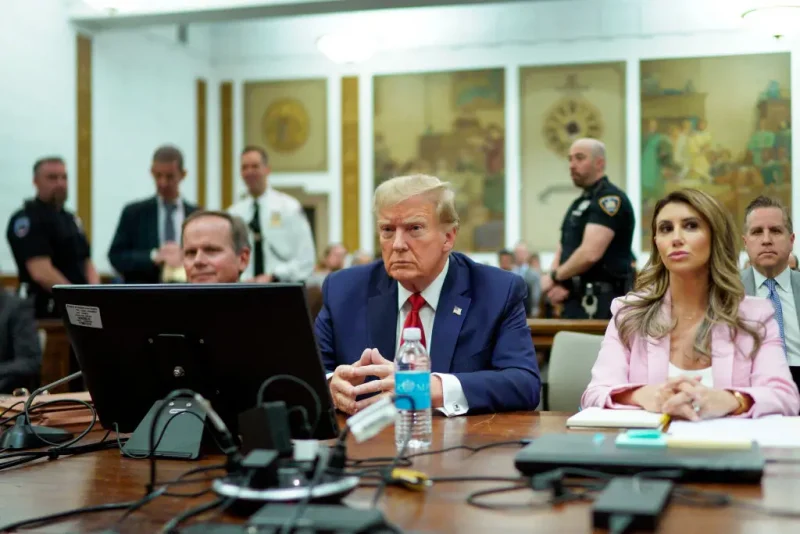 NEW YORK, NEW YORK - DECEMBER 7: Former U.S. President Donald Trump sits at the defense table with his attorneys Christopher Kise (L) and Alina Habba (R) in New York State Supreme Court on December 7, 2023 in New York City. Trump's civil fraud trial alleges that he and his two sons Donald Trump Jr. and Eric Trump conspired to inflate his net worth on financial statements provided to banks and insurers to secure loans. New York Attorney General Letitia James has sued seeking $250 million in damages. (Photo by Eduardo Munoz Alvarez-Pool/Getty Images)