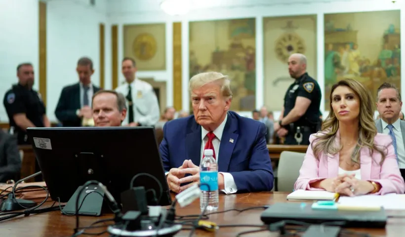 NEW YORK, NEW YORK - DECEMBER 7: Former U.S. President Donald Trump sits at the defense table with his attorneys Christopher Kise (L) and Alina Habba (R) in New York State Supreme Court on December 7, 2023 in New York City. Trump's civil fraud trial alleges that he and his two sons Donald Trump Jr. and Eric Trump conspired to inflate his net worth on financial statements provided to banks and insurers to secure loans. New York Attorney General Letitia James has sued seeking $250 million in damages. (Photo by Eduardo Munoz Alvarez-Pool/Getty Images)