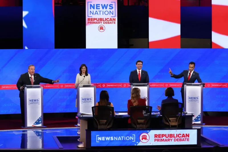 TUSCALOOSA, ALABAMA - DECEMBER 06: Republican presidential candidates (L-R) former New Jersey Gov. Chris Christie, former U.N. Ambassador Nikki Haley, Florida Gov. Ron DeSantis and Vivek Ramaswamy participate in the NewsNation Republican Presidential Primary Debate at the University of Alabama Moody Music Hall on December 6, 2023 in Tuscaloosa, Alabama. The four presidential hopefuls squared off during the fourth Republican primary debate without current frontrunner and former U.S. President Donald Trump, who has declined to participate in any of the previous debates. (Photo by Justin Sullivan/Getty Images)
