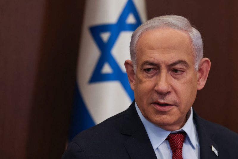 Israeli Prime Minister Benjamin Netanyahu heads the weekly cabinet meeting at his office in Jerusalem on December 10, 2023. (Photo by RONEN ZVULUN / POOL / AFP) (Photo by RONEN ZVULUN/POOL/AFP via Getty Images)