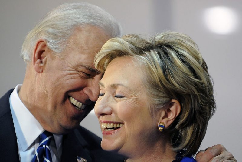 SCRANTON, PA - OCTOBER 12: Democratic vice presidential candidate U.S. Senator Joe Biden (D-DE) and U.S. Sen. Hillary Clinton (D-NY) smile at a rally in support of Democratic presidential nomineee U.S. Sen. Barack Obama (D-IL)October 12, 2008 in Scranton, Pennsylvania. With family ties to Scranton, both Biden and Clinton have teamed up to rally supporters in Pennsylvania before moving on to campaign for Obama in battleground states. (Photo by Jeff Fusco/Getty Images)