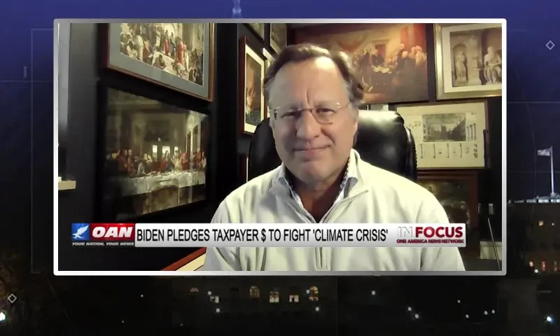 Video still from In Focus on One America News Network showing a split screen of the host on the left side, and on the right side is the guest, Dave Brat.