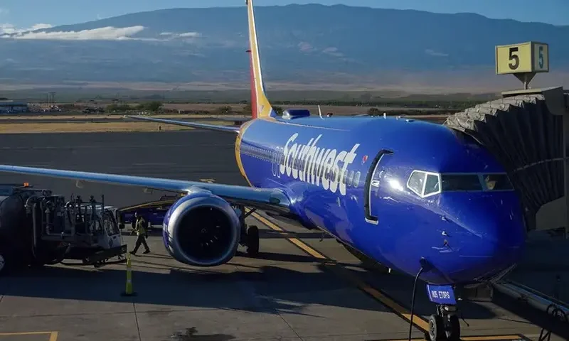 A Southwest plane is shown at the gate at Kahului Airport in Kahului, Maui, Hawaii, U.S., August 16, 2023. REUTERS/Mike Blake/File Photo