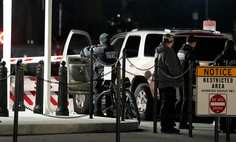 US Secret Service police investigate near a vehicle that hit a security barrier at a entry point for the White House complex, January 8, 2024, in Washington. (Photo via; Mark Schiefelbein/AP)
