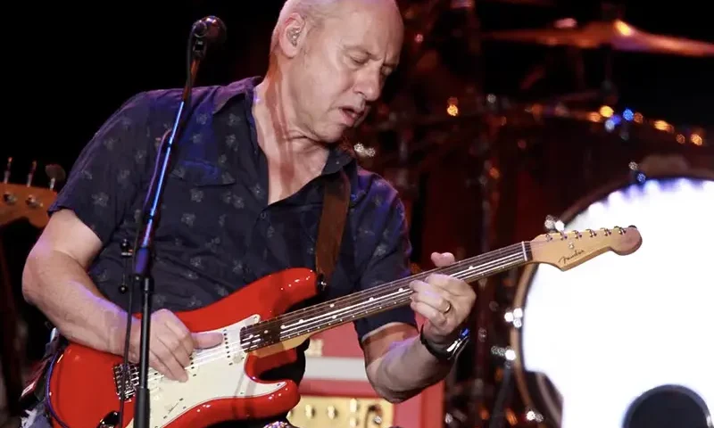 British guitarist Mark Knopfler performs during the 44th Montreux Jazz Festival in Montreux July 15, 2010. REUTERS/Denis Balibouse/File Photo
