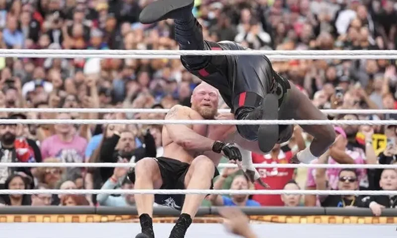 Omos (black pants) and Brock Lesnar (black shorts) during Wrestlemania Night 2 at SoFi Stadium. Mandatory Credit: Joe Camporeale-USA TODAY Sports/files