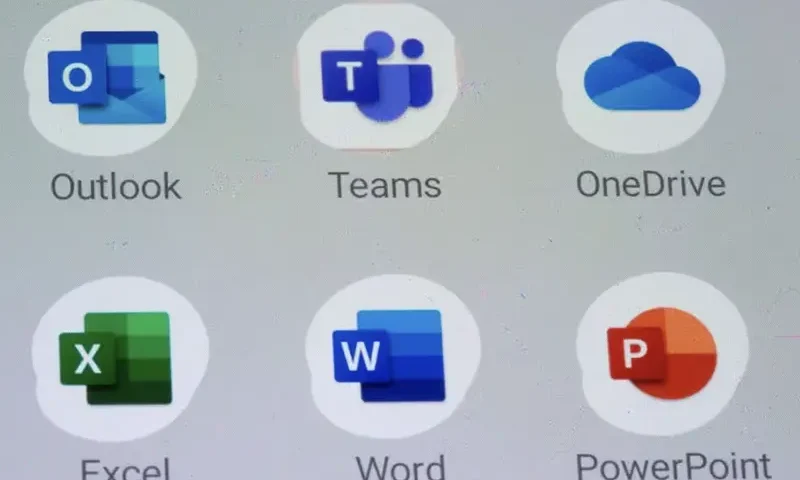 Microsoft apps are seen on the smartphone placed on the keyboard in this illustration taken, July 26, 2021. REUTERS/Dado Ruvic/Illustration