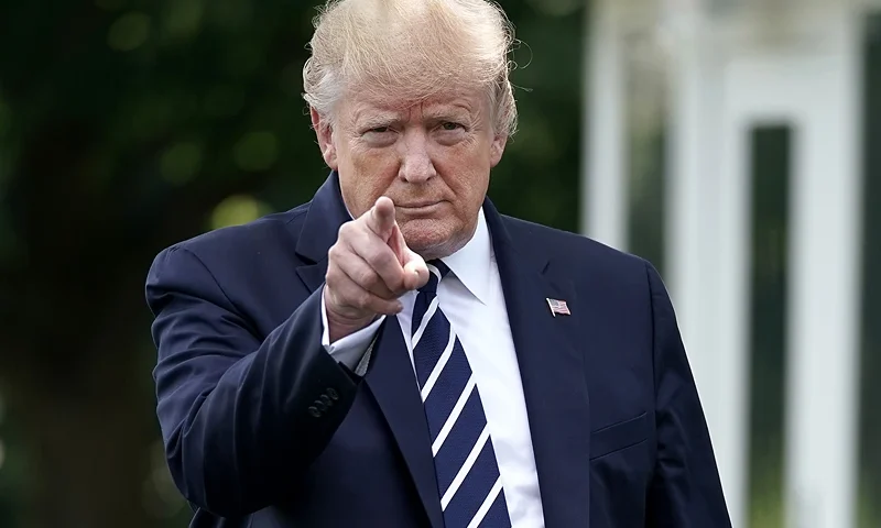 President Trump And First Lady Melania Depart White House For New Jersey WASHINGTON, DC - JULY 19: U.S. President Donald Trump walks out of the White House before departing July 19, 2019 in Washington, DC. Trump is traveling to New Jersey to host a fundraising dinner and spend the weekend at his Trump National Golf Club in Bedminster. (Photo by Chip Somodevilla/Getty Images)