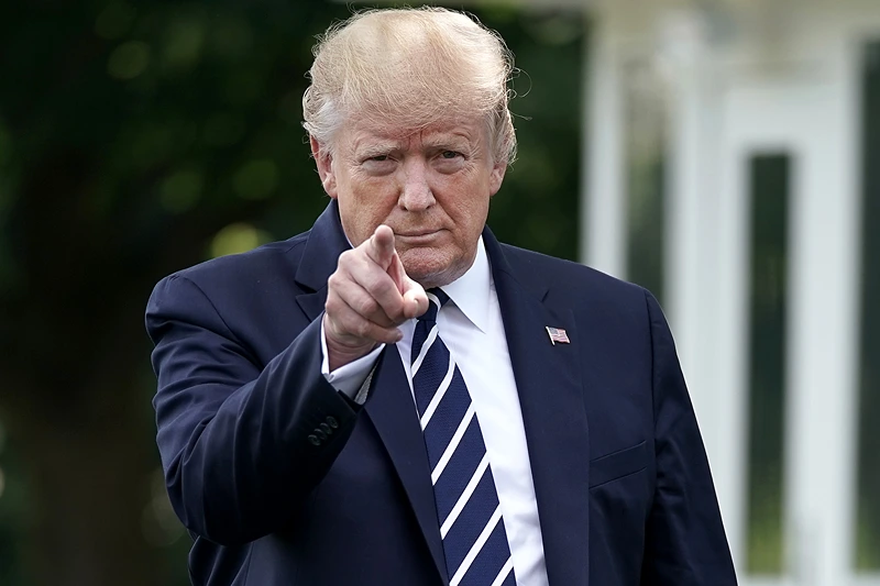 President Trump And First Lady Melania Depart White House For New Jersey
WASHINGTON, DC - JULY 19: U.S. President Donald Trump walks out of the White House before departing July 19, 2019 in Washington, DC. Trump is traveling to New Jersey to host a fundraising dinner and spend the weekend at his Trump National Golf Club in Bedminster. (Photo by Chip Somodevilla/Getty Images)