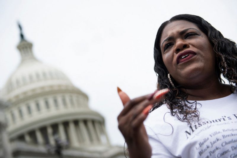 Rep. Cori Bush (D-MO) speaks to the press as people continue to gather on Capitol Hill to protest the end of the eviction moratorium on August 3, 2021, in Washington, DC. - Rep. Bush has been camping out at the front steps of the US Capitol to protest the ending of the eviction moratorium.The White House has instructed government agencies to do what they can to prevent evictions in properties in federal programs or with federal loan guarantees. (Photo by Brendan Smialowski / AFP) (Photo by BRENDAN SMIALOWSKI/AFP via Getty Images)